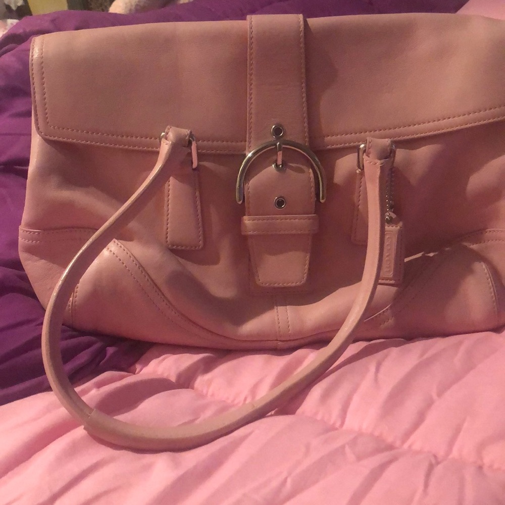 - Coach baby pink